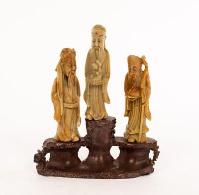 Appraisal: A Chinese carved soapstone group of three deities th Century