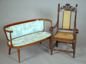 Appraisal: An Edwardian mahogany and inlaid two seat parlour settee the