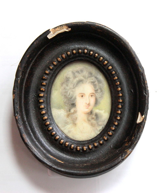 Appraisal: A POSSIBLY GEORGIAN MINIATURE of a young lady with ringlets