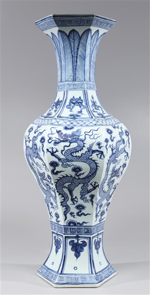 Appraisal: Tall Chinese hexagonal blue and white porcelain dragon vase the