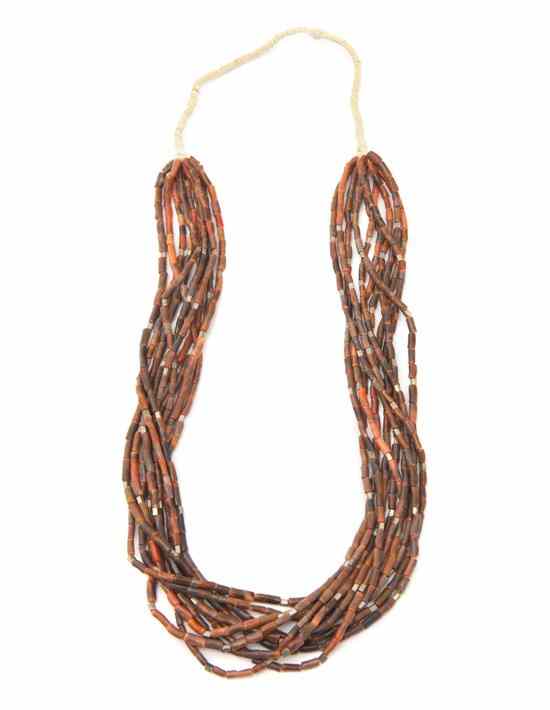 Appraisal: A Navajo Necklace with ten strands of coral with rolled