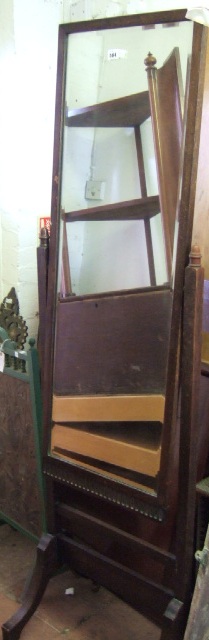 Appraisal: A mid th century oak framed cheval mirror with bevelled