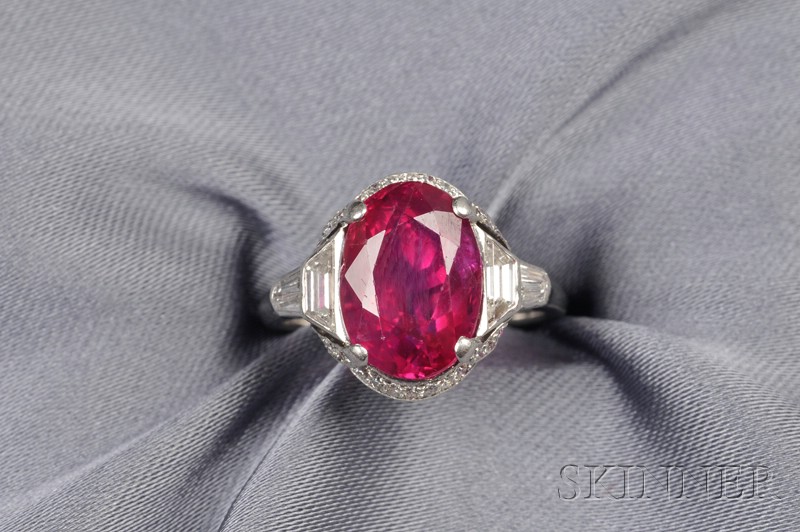 Appraisal: Platinum Ruby and Diamond Ring prong-set with an oval-cut ruby