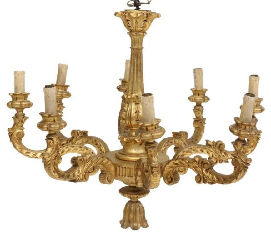 Appraisal: Italian giltwood eight-light chandelier early th c fluted standard with