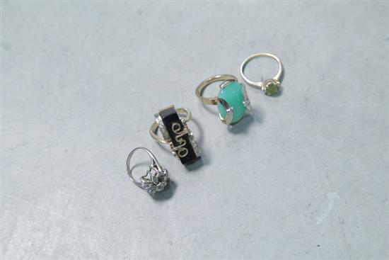 Appraisal: FOUR LADIES RINGS All marked K One with small green