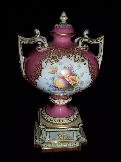 Appraisal: A Royal Worcester two-handled urn and cover dated the pink