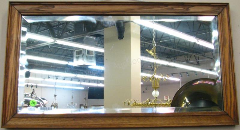 Appraisal: An antique wall mirror ash frame with beveled glass ca