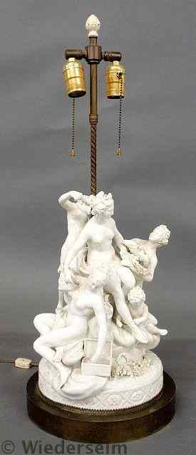 Appraisal: Porcelain figural group converted to an electric table lamp h