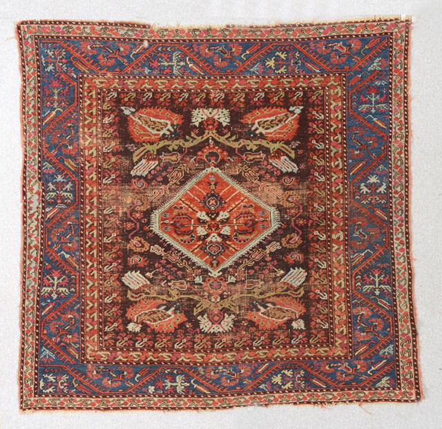 Appraisal: A TURKISH KULA RUG with central rust ground diamond and