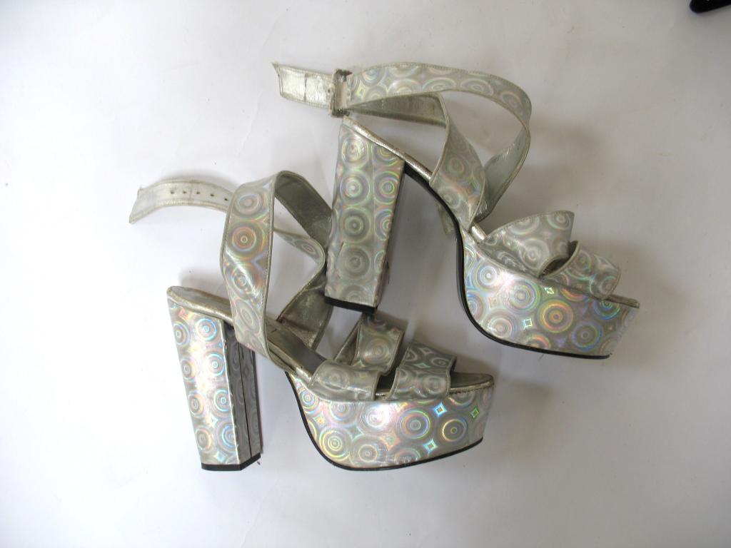 Appraisal: A pair of 's style silver psychedelic platform strap shoes