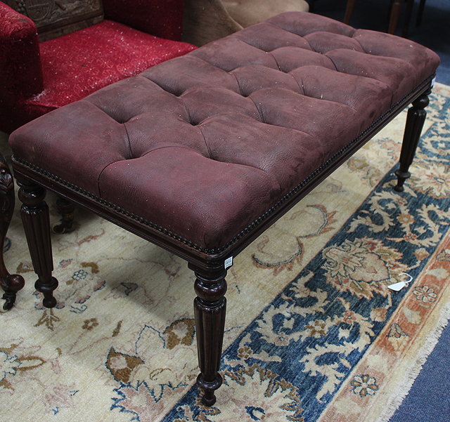 Appraisal: A SUEDE BUTTON UPHOLSTERED DRESSING STOOL standing on ring turned