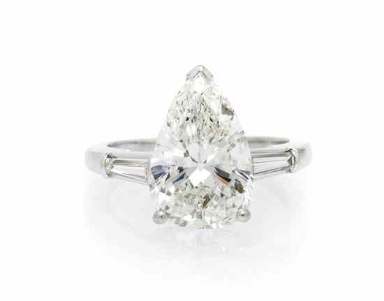 Appraisal: A Platinum and Diamond Ring containing one pear shape brilliant