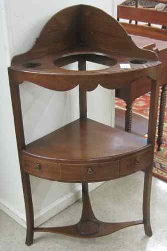 Appraisal: FEDERAL MAHOGANY CORNER WASHSTAND American early th century in the