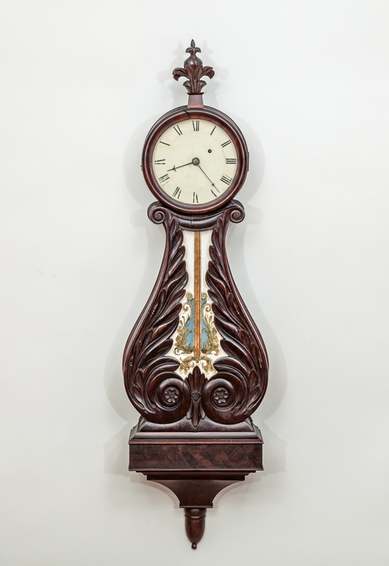 Appraisal: LATE FEDERAL CARVED MAHOGANY BANJO CLOCK With pendulum and an