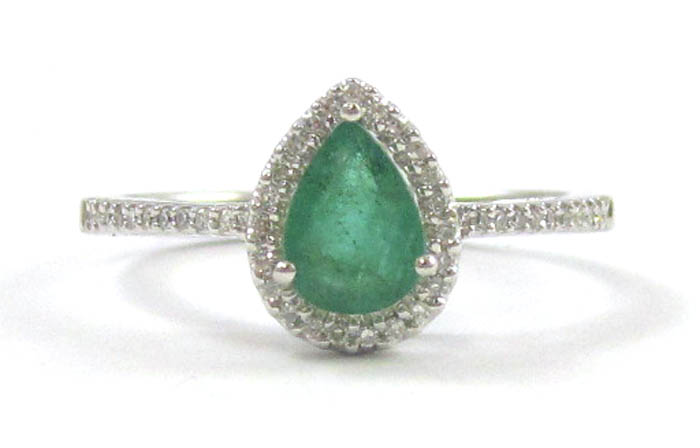 Appraisal: EMERALD DIAMOND AND FOURTEEN KARAT WHITE GOLD RING with round-cut