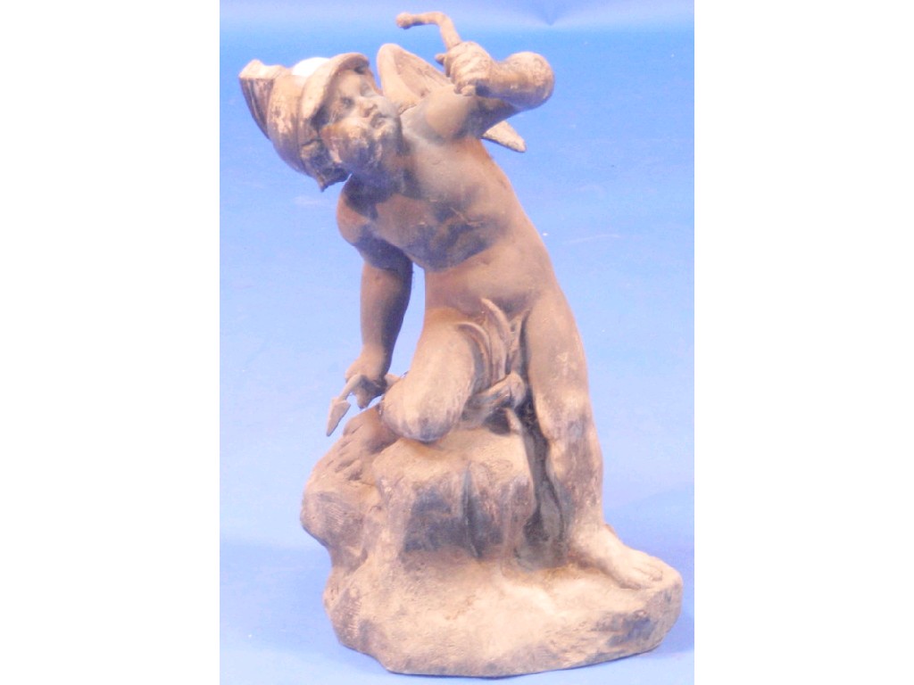 Appraisal: A thC lead figure of Cupid on a rocky outcrop