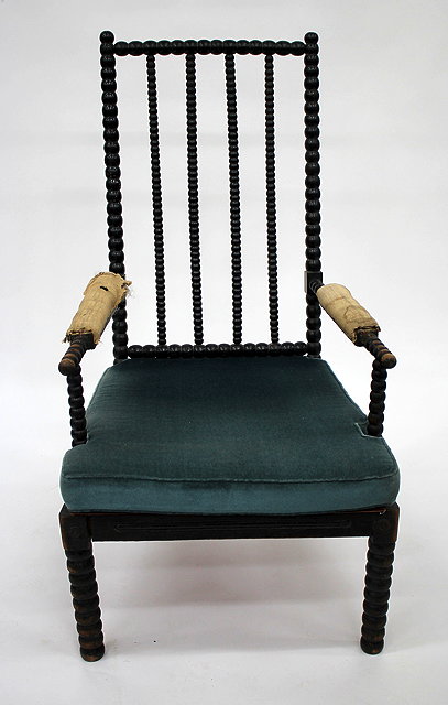 Appraisal: A VICTORIAN EBONISED BOBBIN TURNED OPEN ARMCHAIR cm wide together