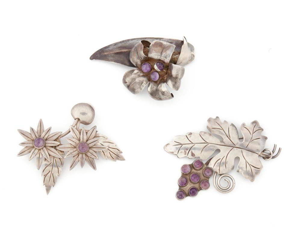 Appraisal: A group of Fred Davis silver and amethyst brooches Pre-