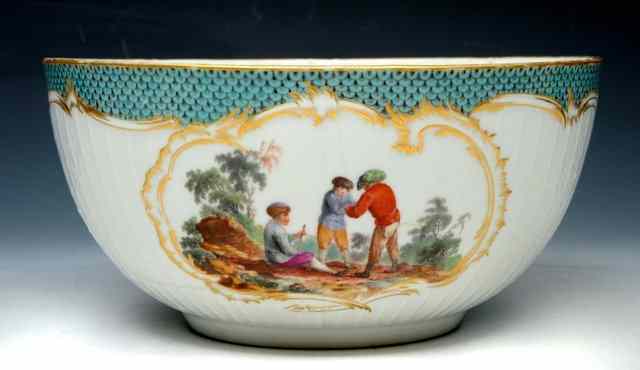 Appraisal: A BERLIN PORCELAIN CIRCULAR BOWL painted with two reserve panels