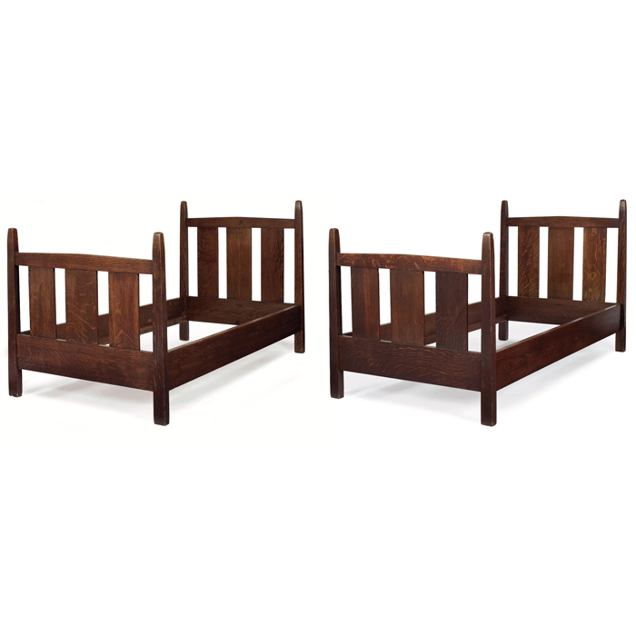 Appraisal: Gustav Stickley beds pair twin-size with three wide slats at