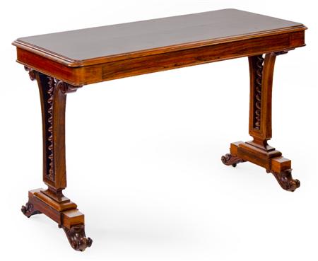 Appraisal: A Victorian rosewood library table the moulded rectangular top over