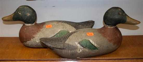 Appraisal: Pair of carved wood duck decoys Estimate - No condition