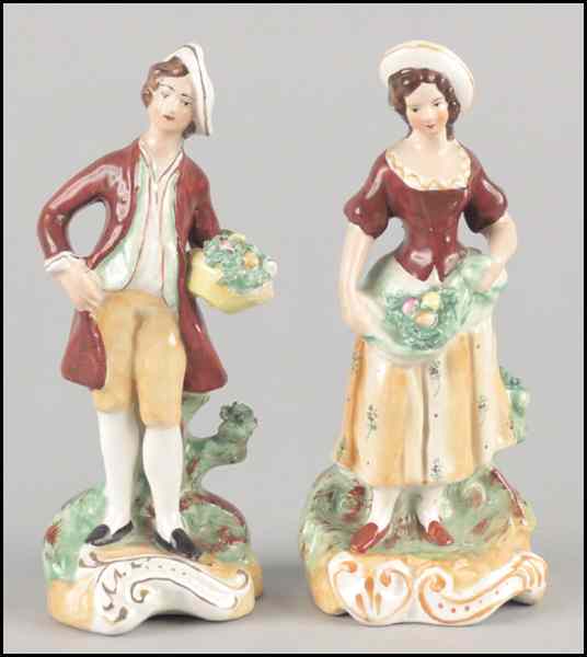 Appraisal: TWO ENGLISH STAFFORDSHIRE PORCELAIN FIGURES Taller '' Condition No Specific