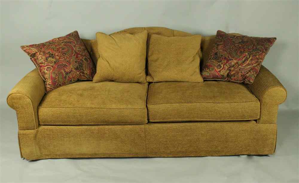 Appraisal: CHEVRON VELVET UPHOLSTERED SOFA WITH SEAT CUSHIONS having an arched