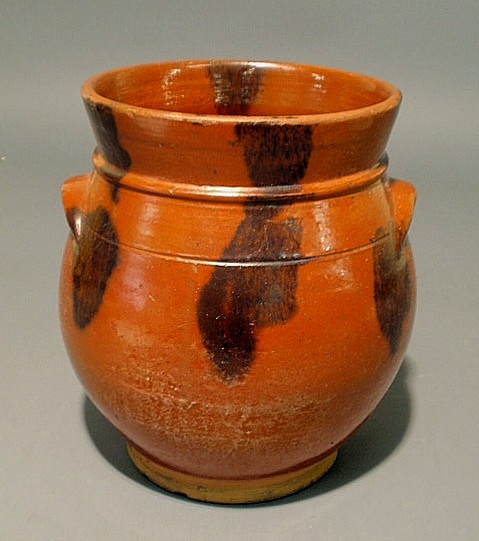 Appraisal: Pennsylvania redware jar th c with black splash manganese decoration