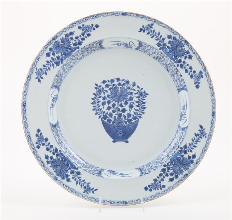 Appraisal: CHINESE BLUE AND WHITE PORCELAIN CHARGER Centered by a flower-filled