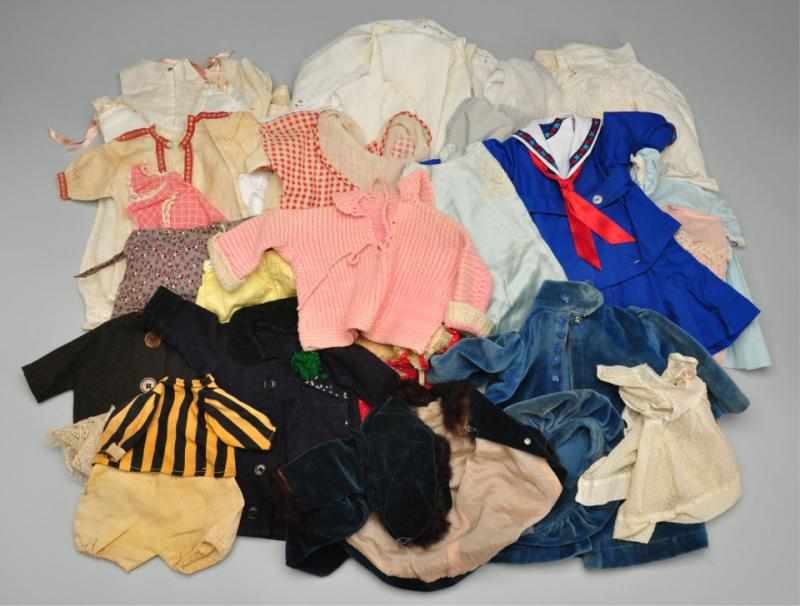 Appraisal: Large Lot of Antique Doll Clothing Description Tagged suit for