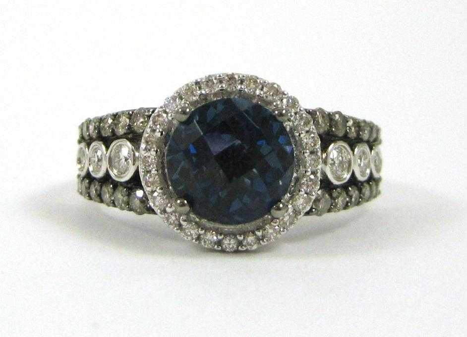 Appraisal: LEVIAN BLUE TOPAZ AND DIAMOND RING The k white gold