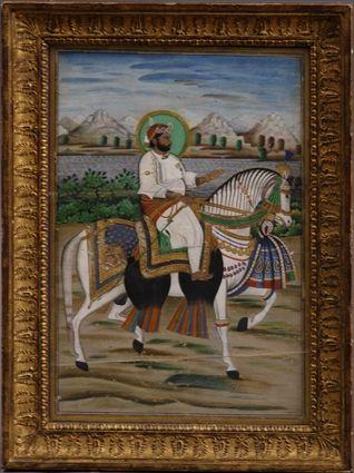 Appraisal: INDIAN PAINTED MANUSCRIPT MINIATURE NOBLEMAN ON WHITE STALLION Watercolor on