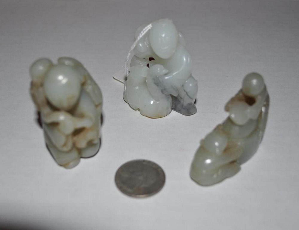 Appraisal: Three Chinese Jade Hardstone Carvings comprising boy and squirrel two