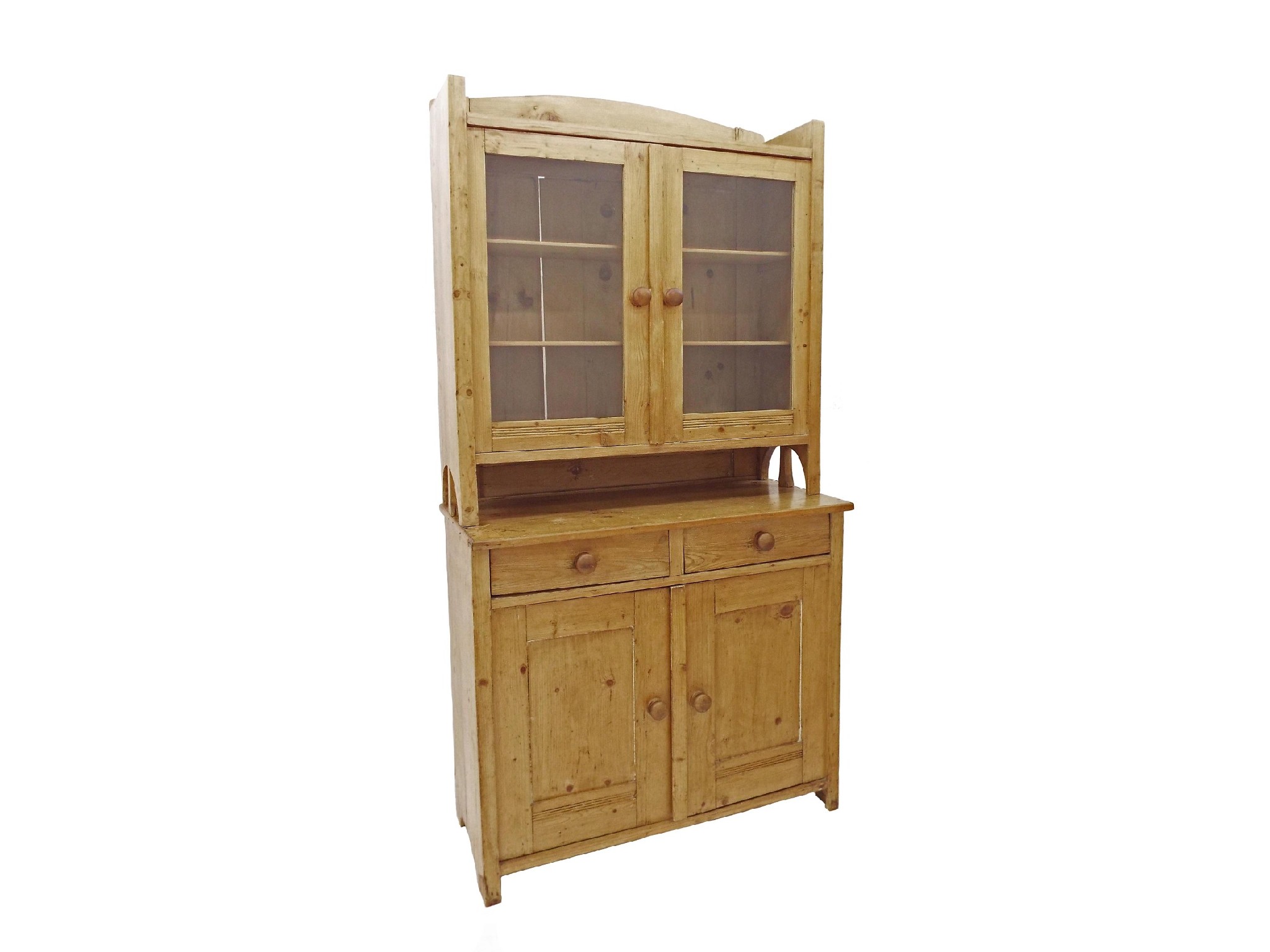 Appraisal: Continental pine dresser the raised back comprising two glazed doors