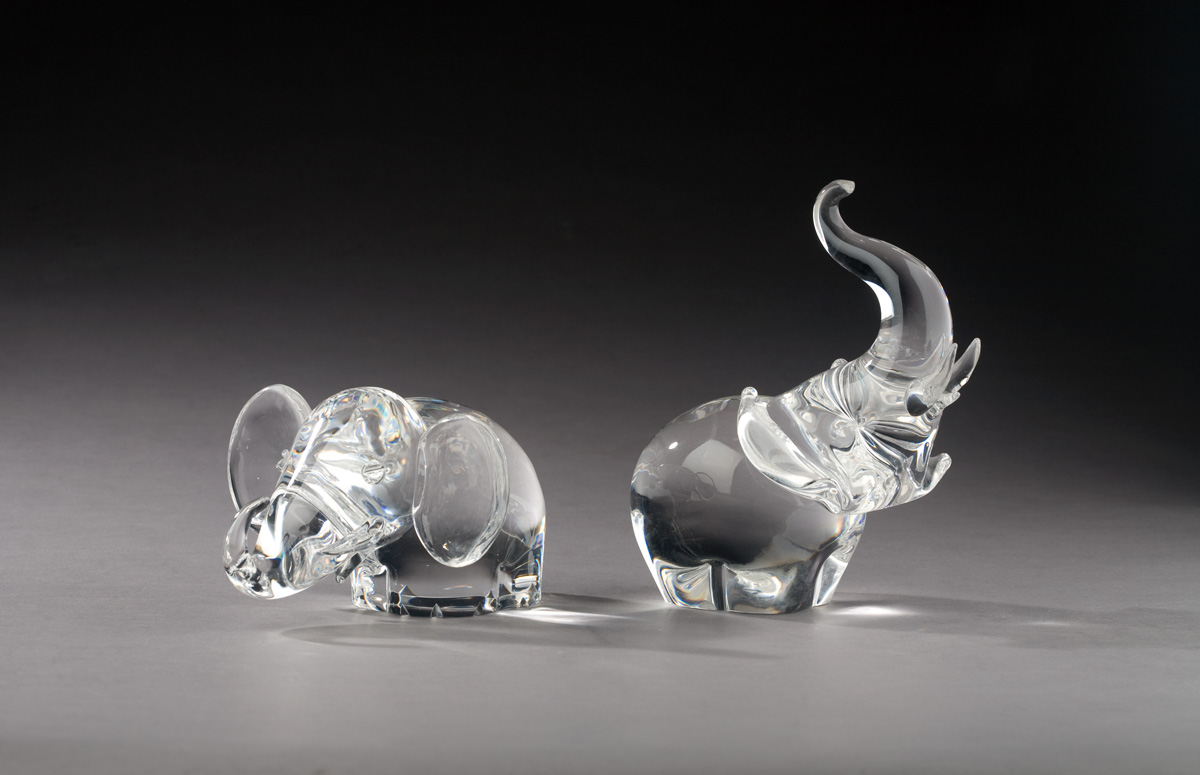 Appraisal: TWO STEUBEN GLASS FIGURES OF ELEPHANTS MID-TWENTIETH CENTURY The first