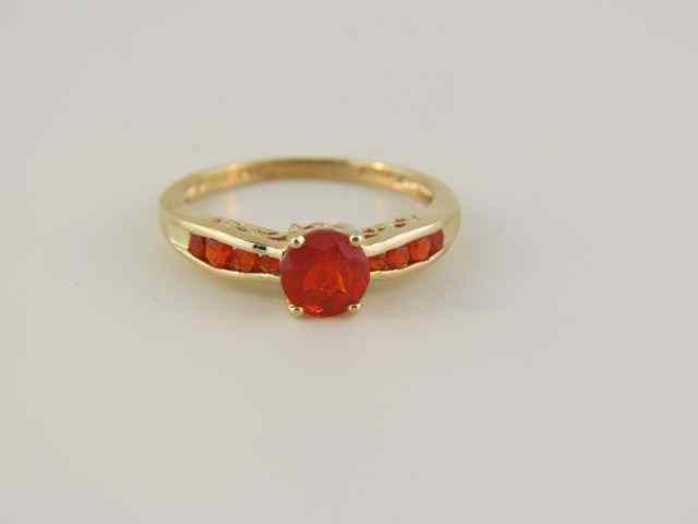 Appraisal: Fire Opal Ring rich orange gems in k yellow gold