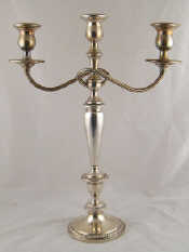 Appraisal: An American white metal tests silver candelabrum marked 'Poole Sterling