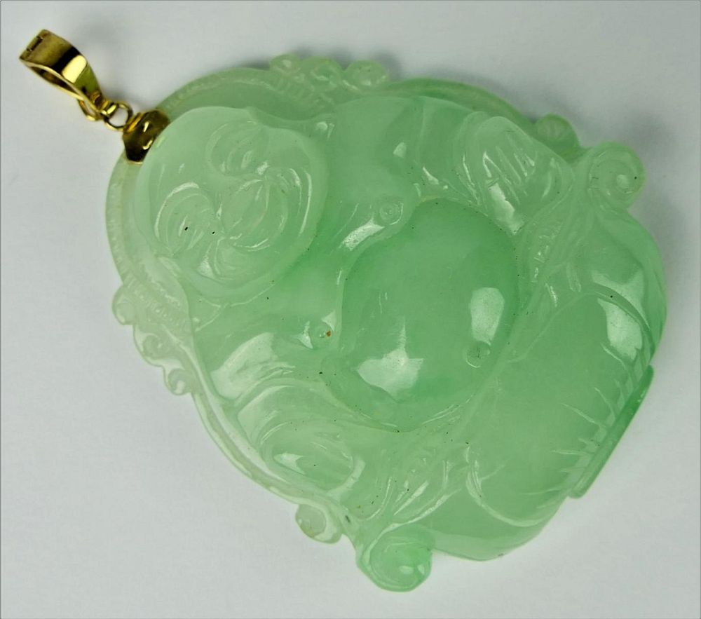 Appraisal: CHINESE K YG BALE TRANSLUCENT GREEN JADE PENDANT Chinese high