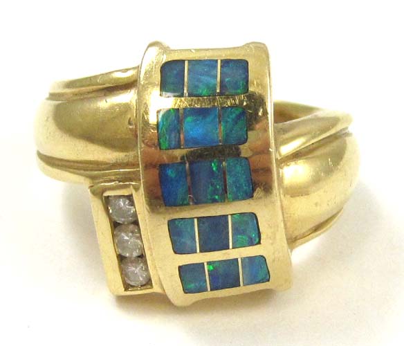 Appraisal: OPAL DIAMOND AND FOURTEEN KARAT GOLD RING Golden Sun Jewelry