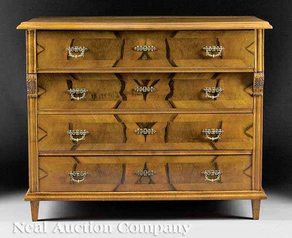 Appraisal: A German or Austrian Carved and Figured Walnut Commode th