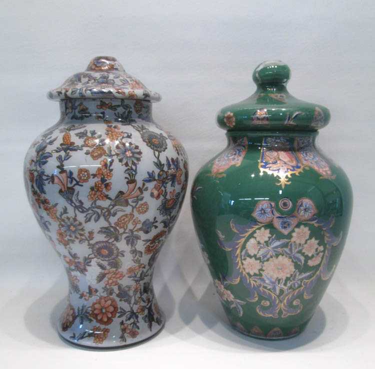 Appraisal: TWO FRENCH EGLOMISE LIDDED URNS reverse painted in floral motifs