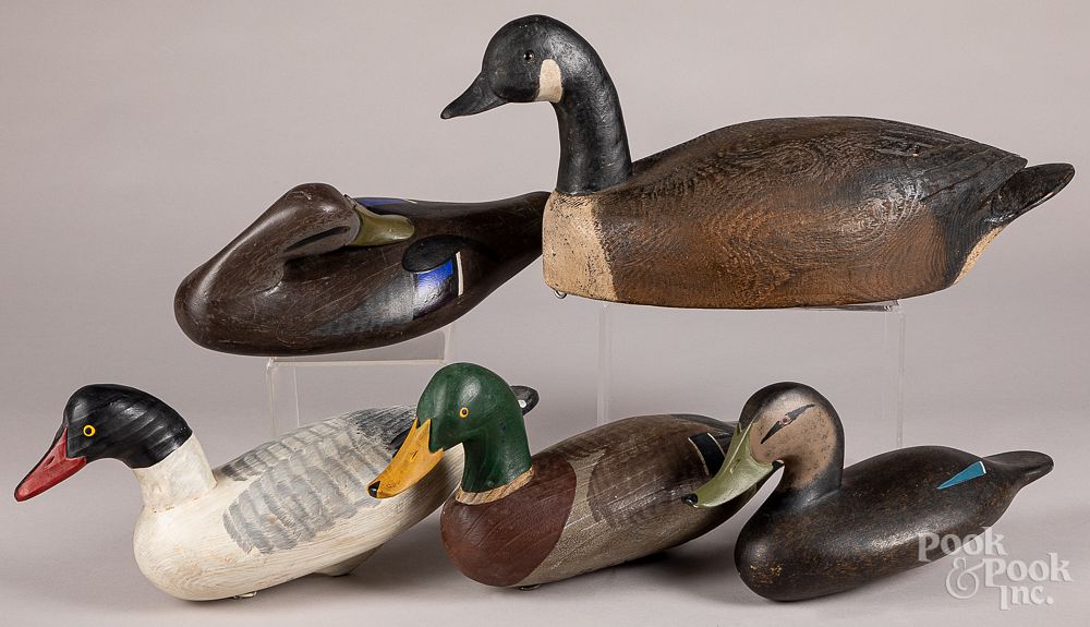 Appraisal: Four carved and painted duck decoys Four carved and painted