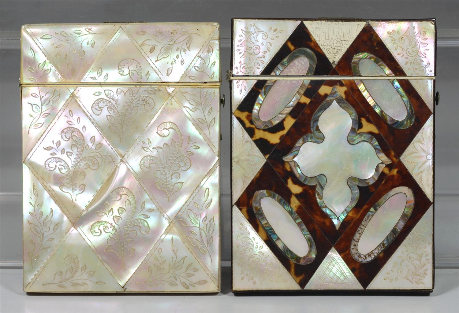 Appraisal: Card cases one finely engraved mother of pearl one inlaid