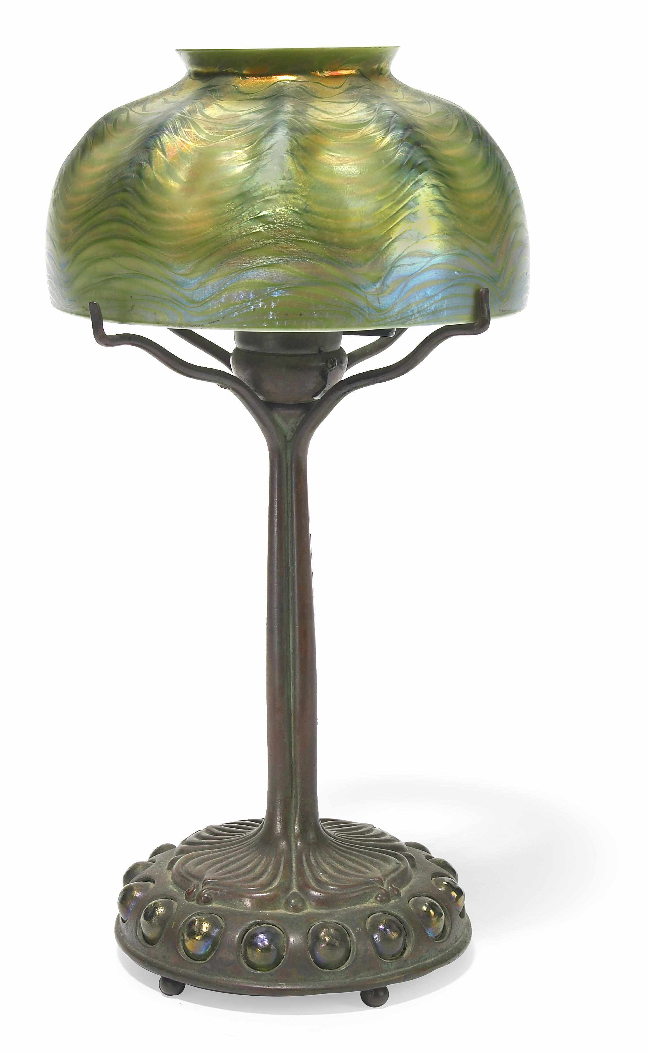 Appraisal: A Tiffany Studios Favrile glass and jeweled bronze desk lamp