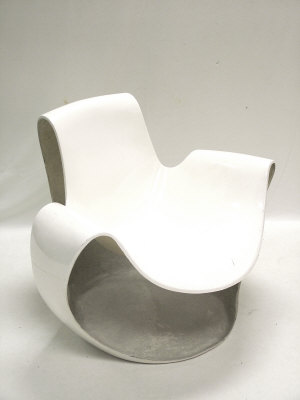 Appraisal: A white moulded fibreglass lounge chair circa probably French in