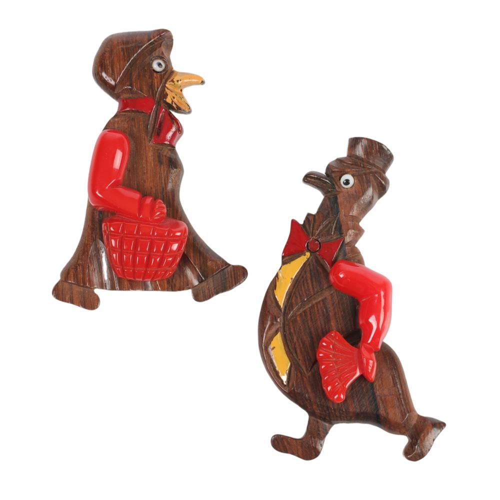 Appraisal: CARVE BAKELITE AND WOOD MOTHER AND FATHER GOOSE PINS WITH