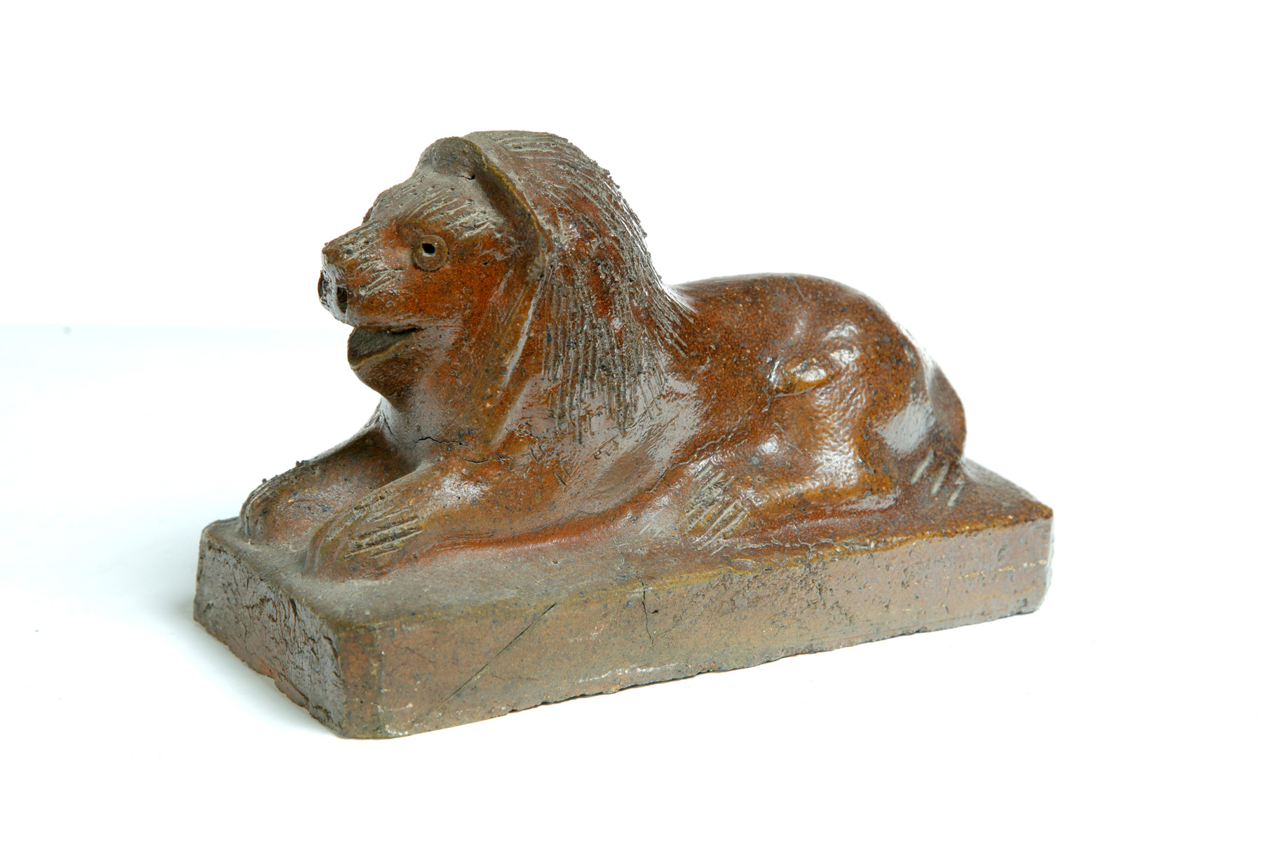 Appraisal: MICHIGAN SEWERTILE LION Grand Ledge th century Reclining lion with