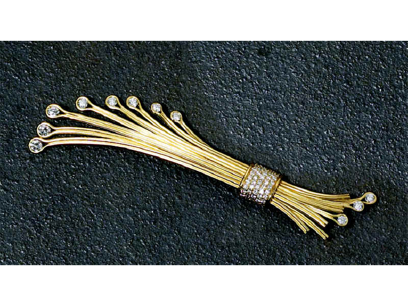 Appraisal: DIAMOND BROOCH k yellow gold haystack brooch set with round