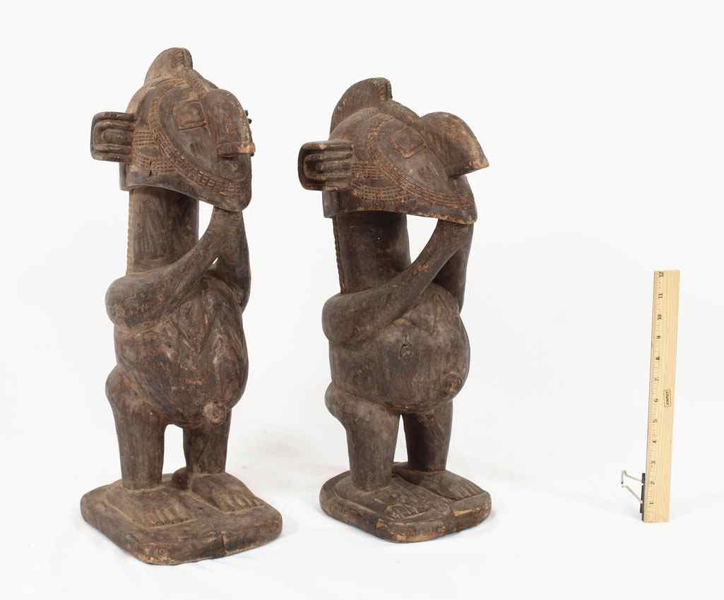 Appraisal: PAIR CARVED AFRICAN BAGA NIMBA FIGURES GUINEA '' x ''